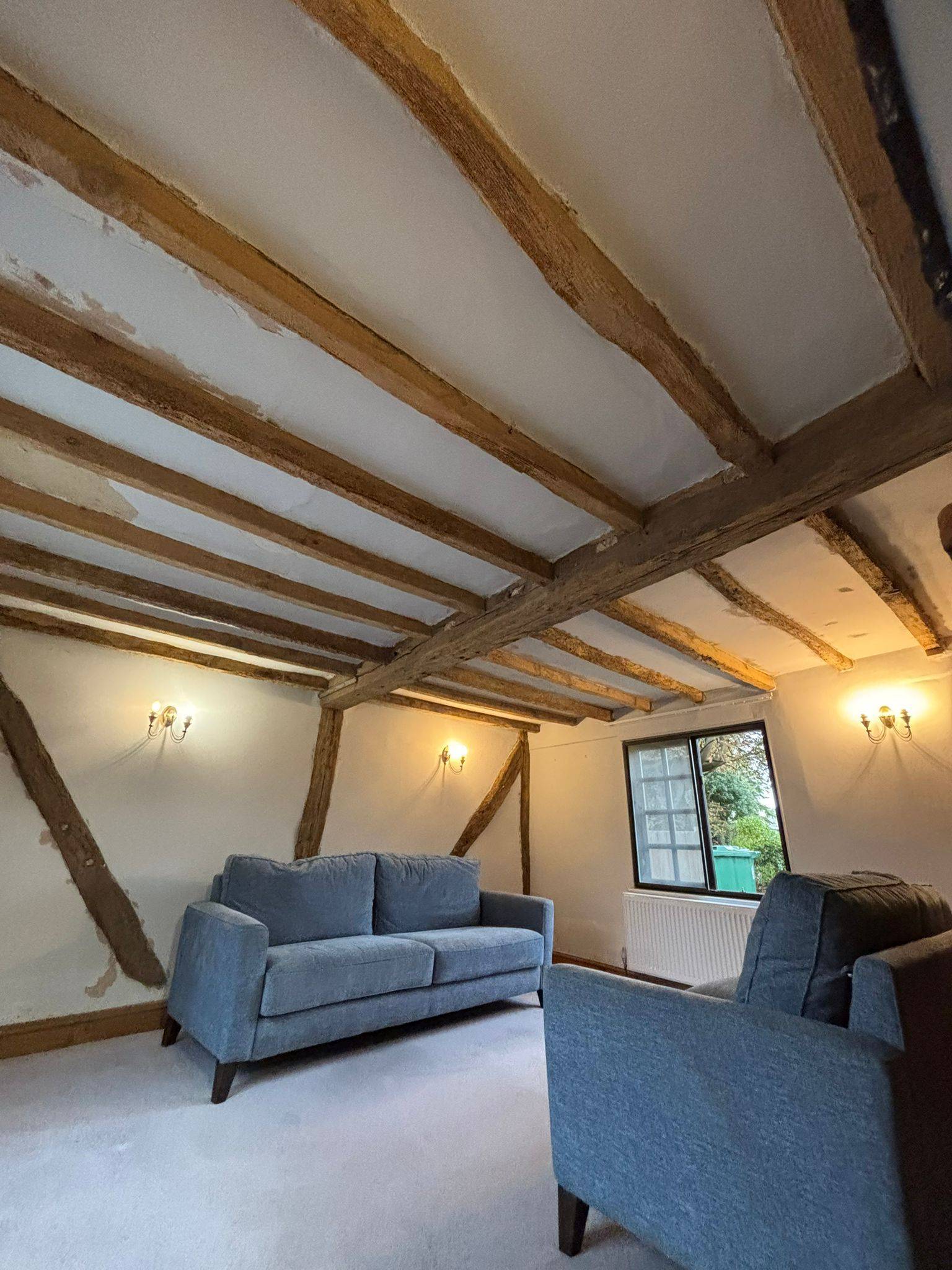 Finished living space with restored beams