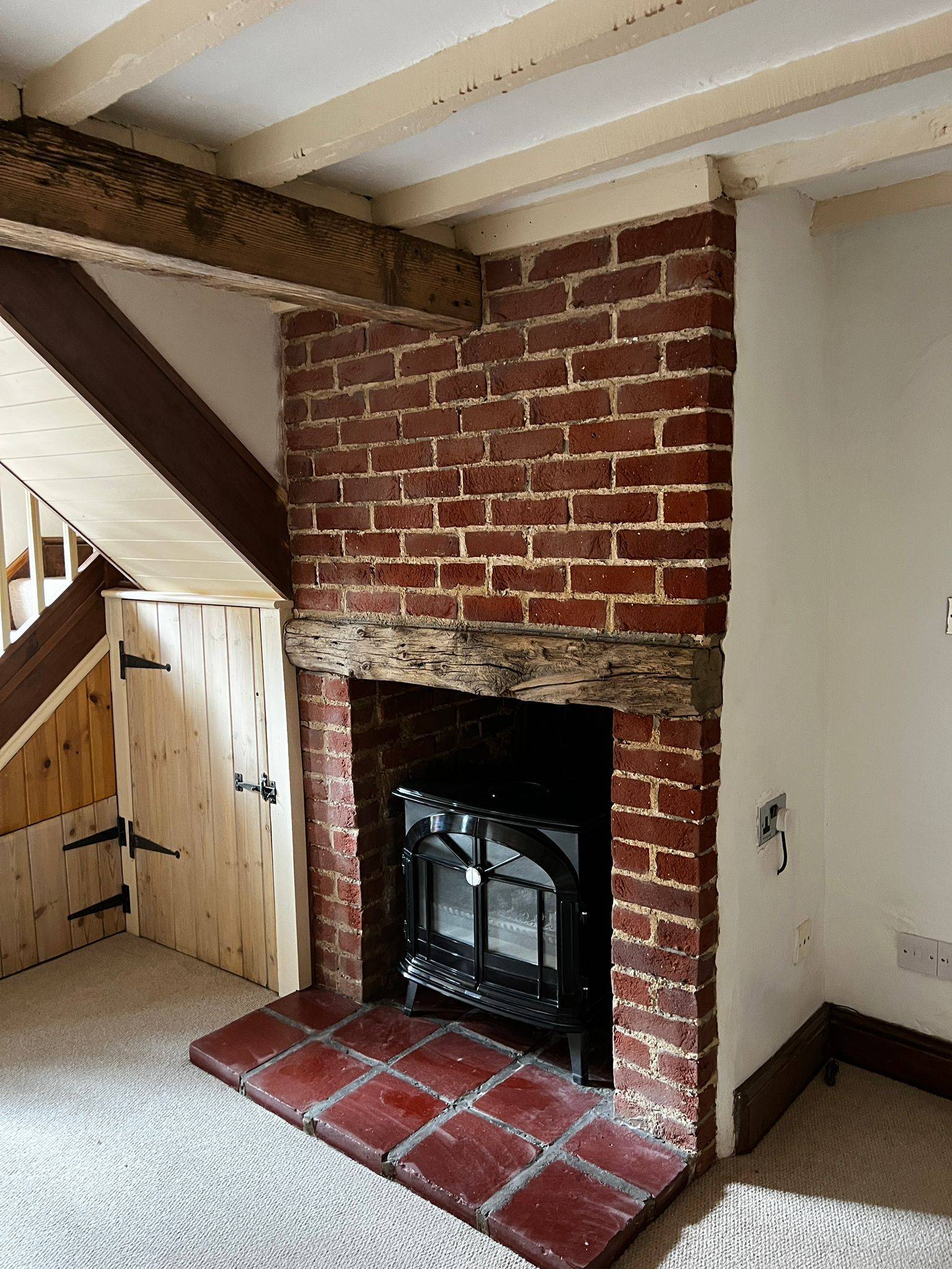 Brick fireplace and beam detail