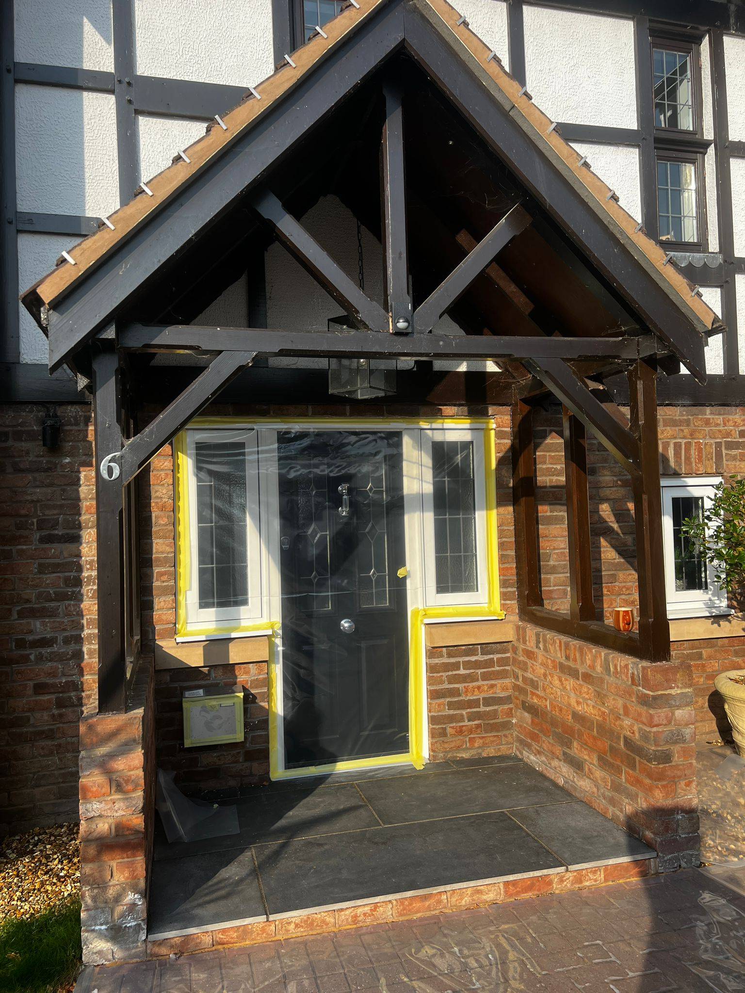 Oak-framed porch before cleaning