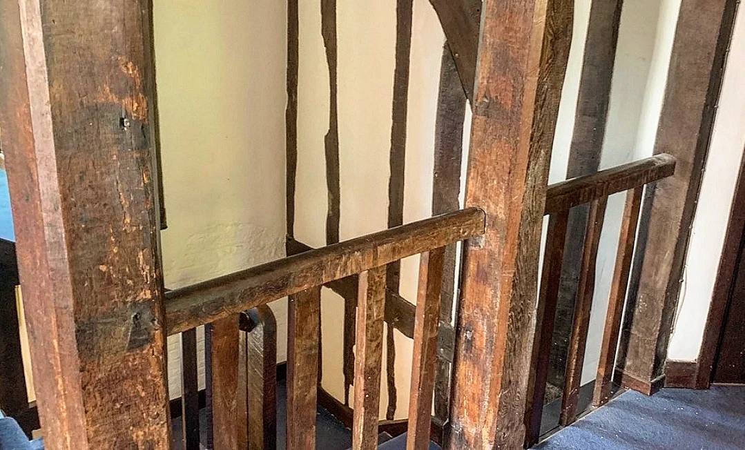 Dark staircase timber before restoration
