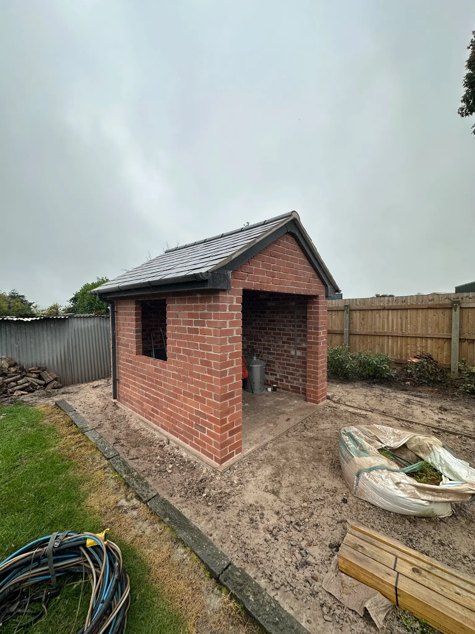 Brick garden outbuilding entrance after surface cleaning